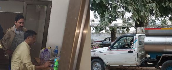 Assistant Commissioner Mirpur, AJK, Sardar Abdul Qadir checking milk samples for contamination using a Lactoscan machine at an entry point in Mirpur, accompanied by Dr. Naeem Kallis and lab staff.