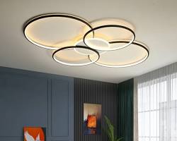 Modern minimalist bedroom ceiling with recessed lighting.