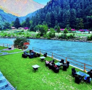 A beautiful hotel near the bank of Neelum River in Keran, Azad Kashmir, with stunning views and a serene atmosphere.