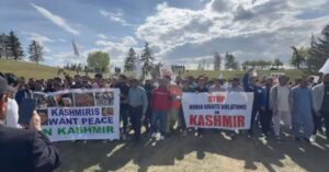 Peaceful protest in Calgary with Kashmiris holding white flags and placards calling for freedom and peace in Jammu and Kashmir.