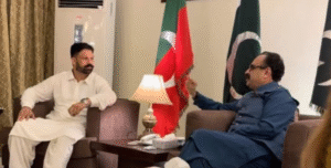 Arshad Bilo sitting with ex Prime Minister of Paskistan administered Kashmir.