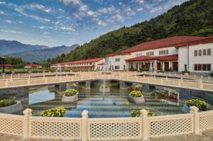 The Lalit Grand Palace offers a royal experience with its stunning architecture and lush gardens. 