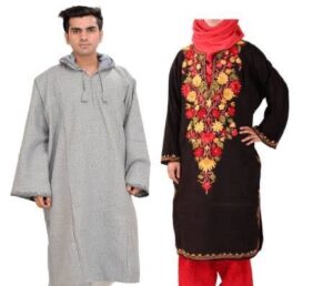 A Kashmiri boy and girl together wearing traditional Kashmiri dresses.