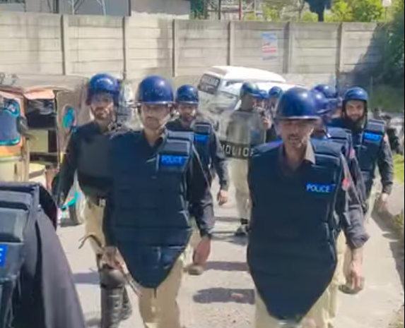 Screen grab showing police personnel in Muzaffarabad, Azad Kashmir.