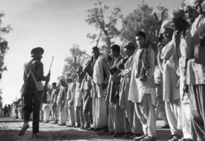 Tribal militias waiting for trucks and weapons to march toward Kashmir